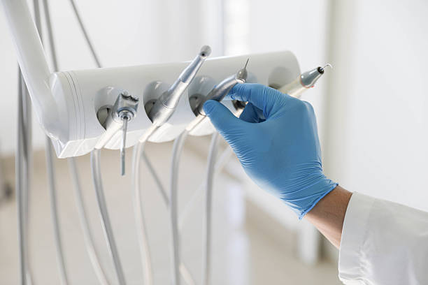 Professional Tooth Extraction technician working in Charlotte, TN